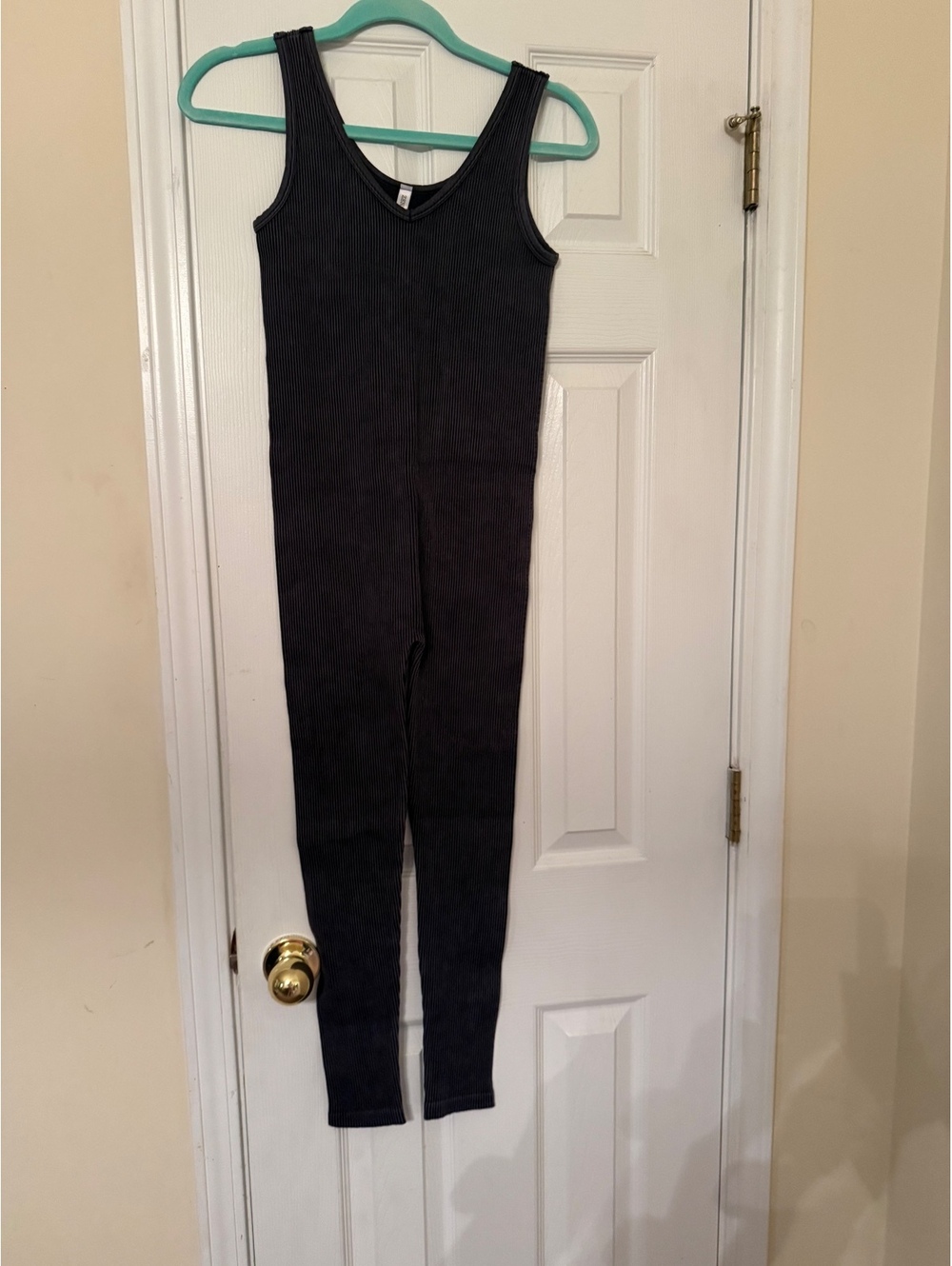 NEW in poly-Seamless Ribbed Sports Bodysuit in Black S/M